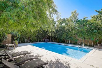 Scenic pool surrounded by lush greenery